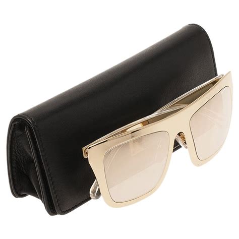 gold dolce and gabbana bag|dolce gabbana gold edition sunglasses.